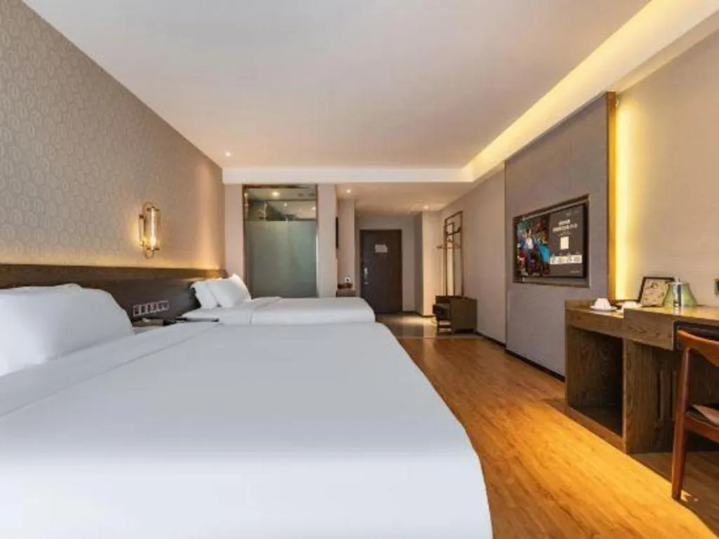 Bed in James Joyce Coffetel Chengdu Jianshe Road Dongjiao Jiyi Square