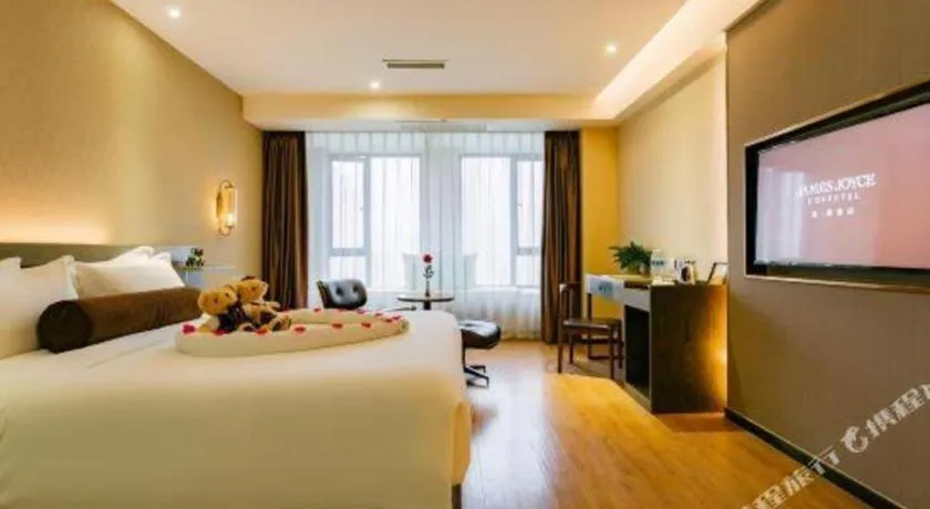 Bed in James Joyce Coffetel Chengdu Jianshe Road Dongjiao Jiyi Square