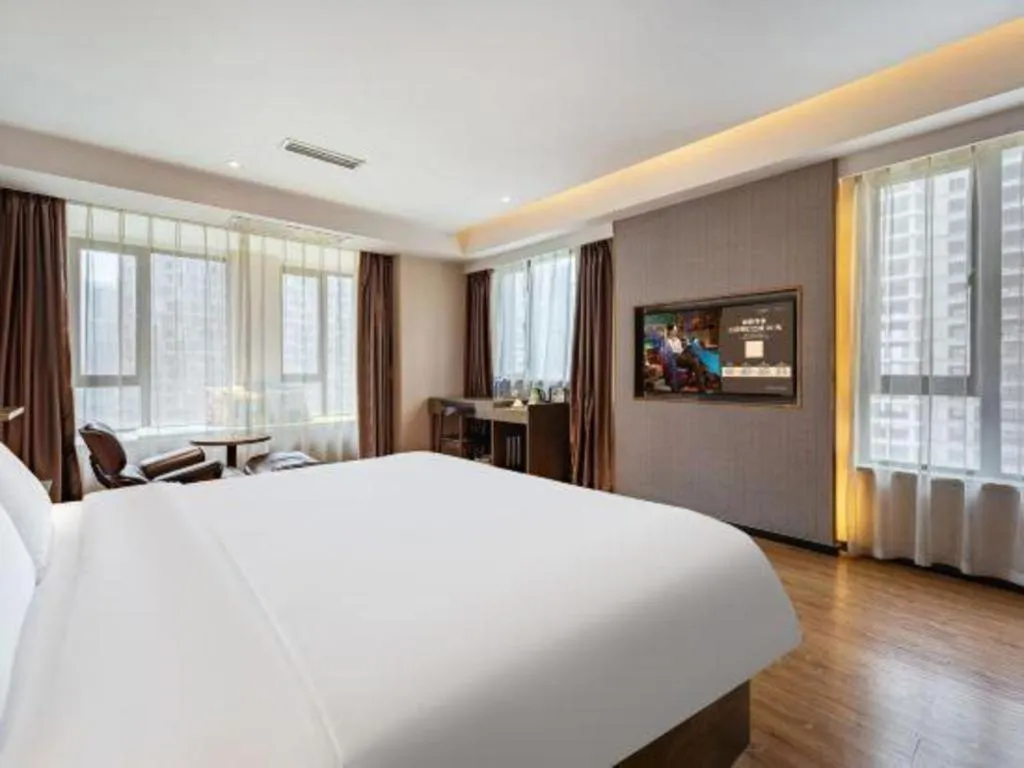 Bed in James Joyce Coffetel Chengdu Jianshe Road Dongjiao Jiyi Square