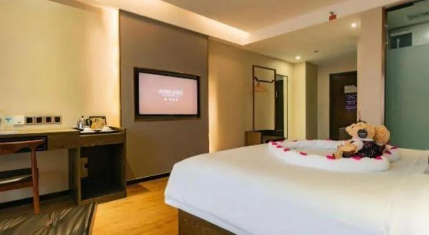 Bed in James Joyce Coffetel Chengdu Jianshe Road Dongjiao Jiyi Square