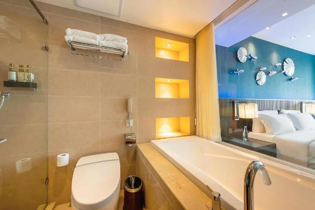 Bed in Guangzhou Crystal Orange Hotel