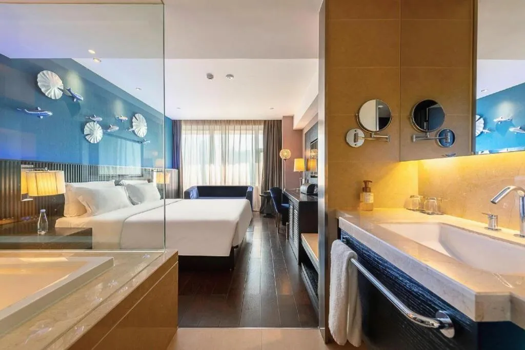 Bed in Guangzhou Crystal Orange Hotel