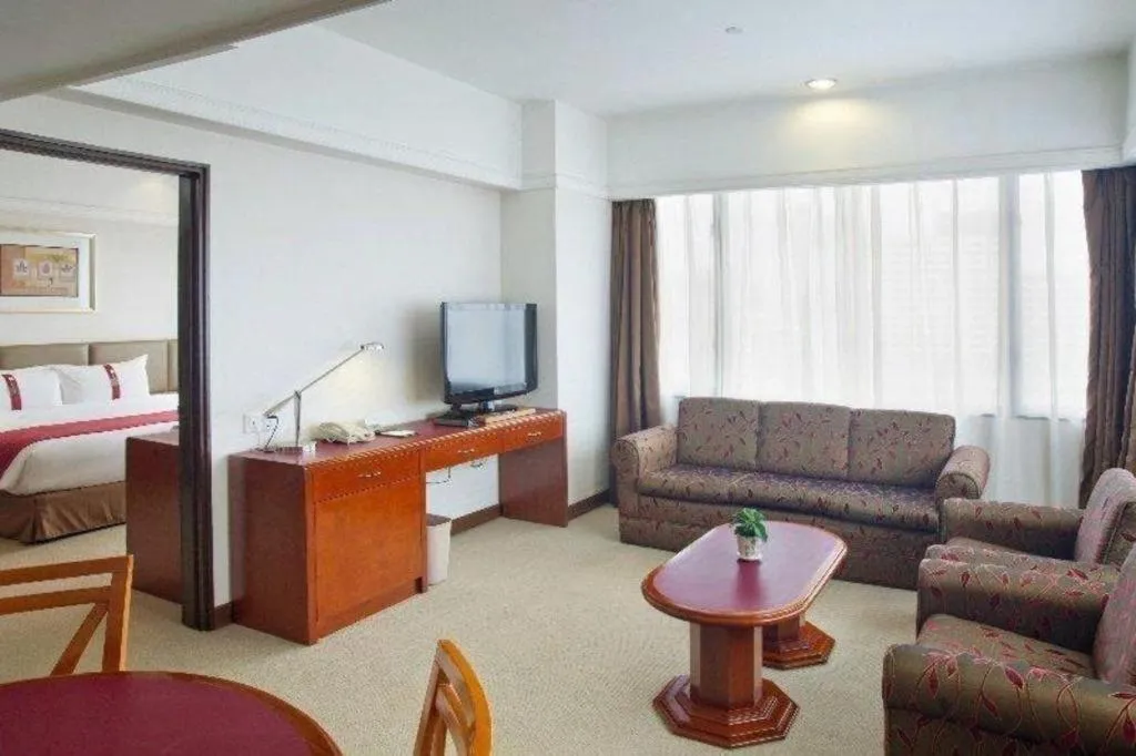 Bed in Guangzhou Crystal Orange Hotel