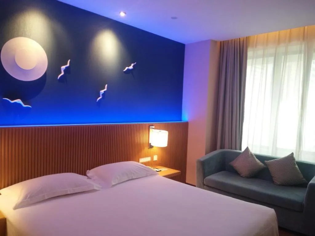 Bed in Guangzhou Crystal Orange Hotel