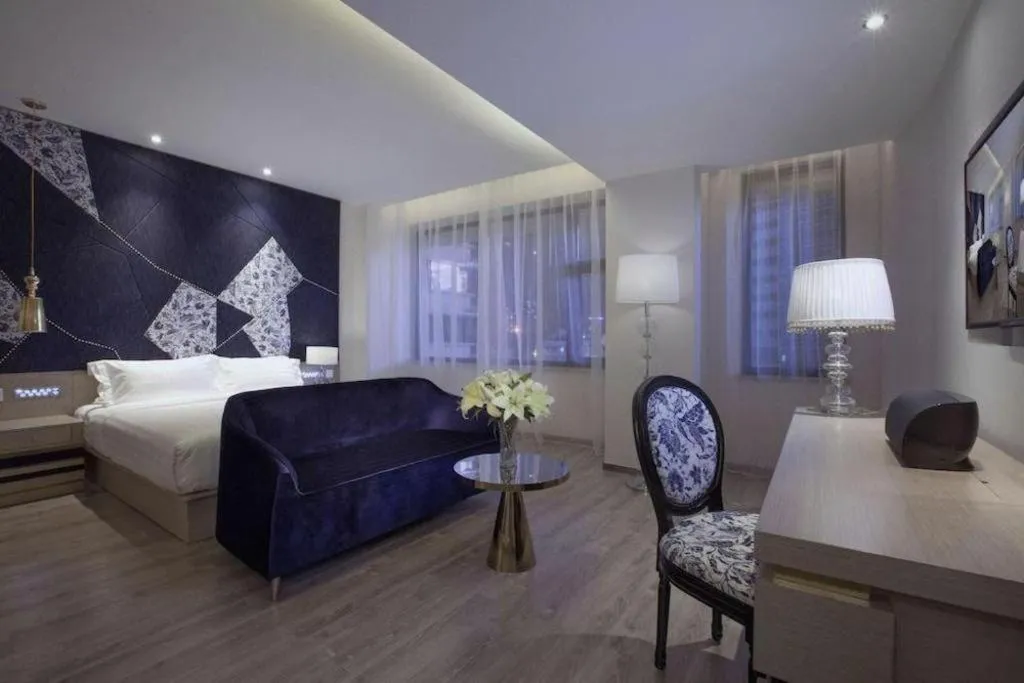 Bed in Guangzhou Crystal Orange Hotel