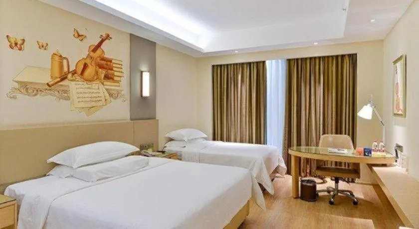 Bed in Vienna International Hotel Chengdu New International Conference and Exhibition Center Branch