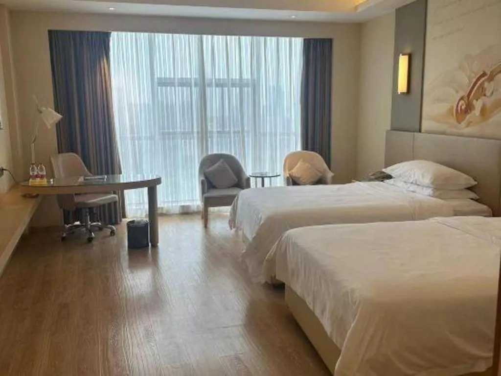 Bed in Vienna International Hotel Chengdu New International Conference and Exhibition Center Branch