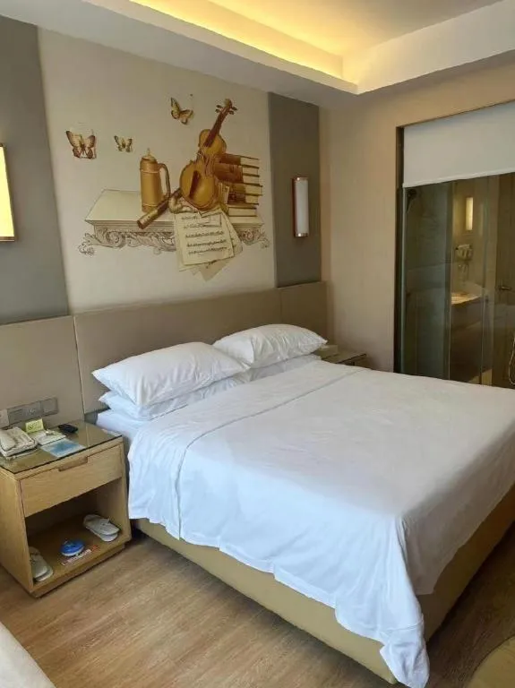 Bed in Vienna International Hotel Chengdu New International Conference and Exhibition Center Branch