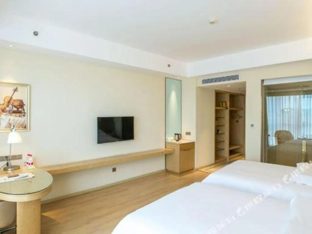 Bed in Vienna International Hotel Chengdu New International Conference and Exhibition Center Branch