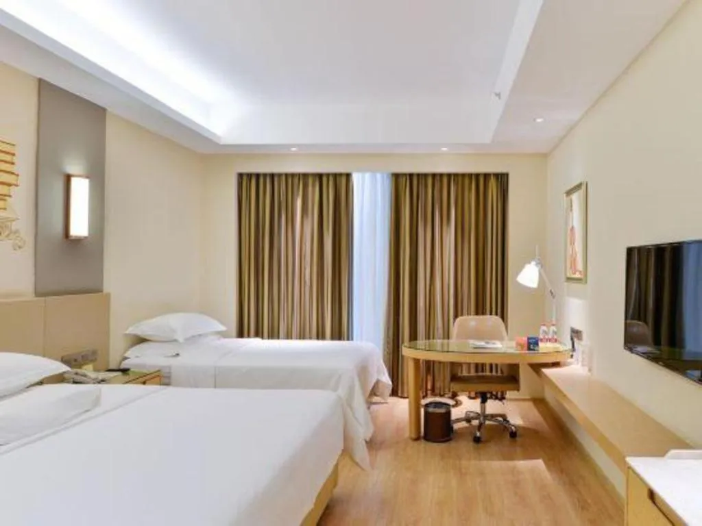 Bed in Vienna International Hotel Chengdu New International Conference and Exhibition Center Branch