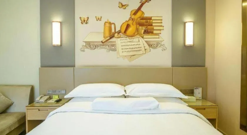 Bed in Vienna International Hotel Chengdu New International Conference and Exhibition Center Branch