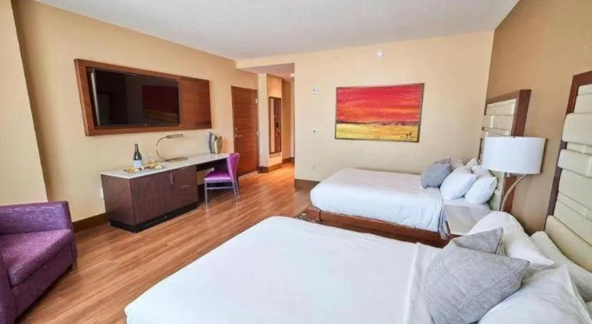 Bed in Vee Quiva Hotel & Casino