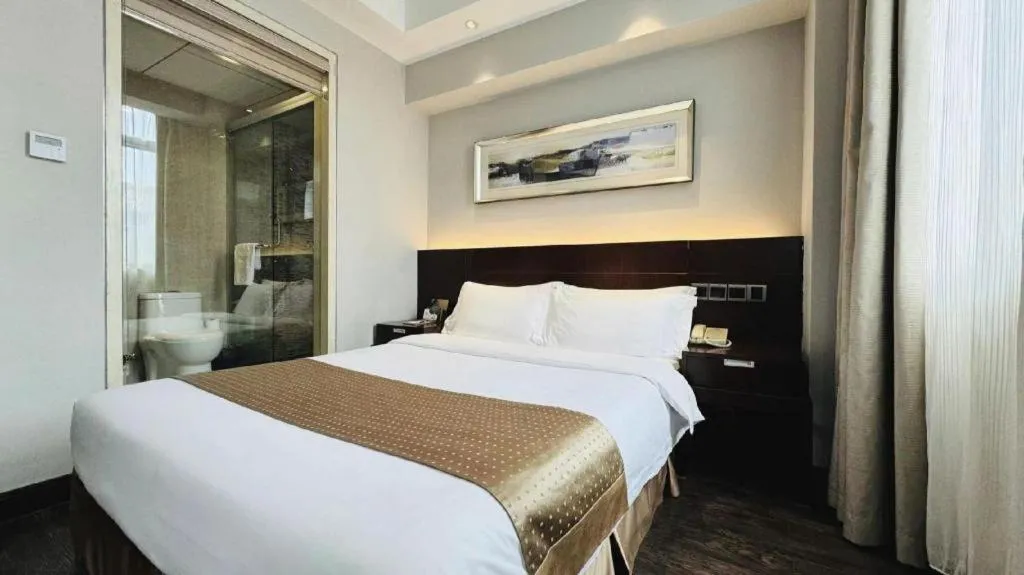Bed in Maixinge Boutique Hotel Waigaoqiao Free Trade Zone