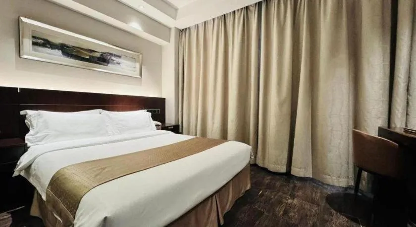Bed in Maixinge Boutique Hotel Waigaoqiao Free Trade Zone