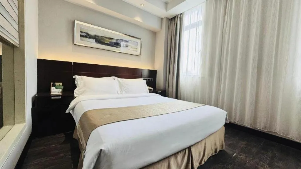 Bed in Maixinge Boutique Hotel Waigaoqiao Free Trade Zone