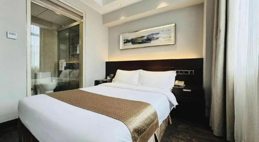 Bed in Maixinge Boutique Hotel Waigaoqiao Free Trade Zone
