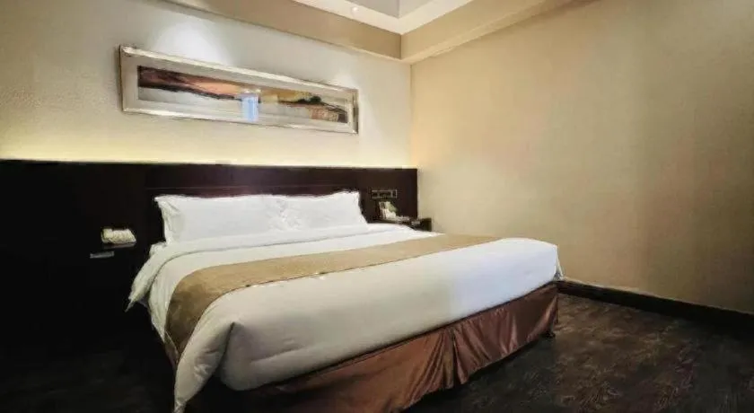 Bed in Maixinge Boutique Hotel Waigaoqiao Free Trade Zone