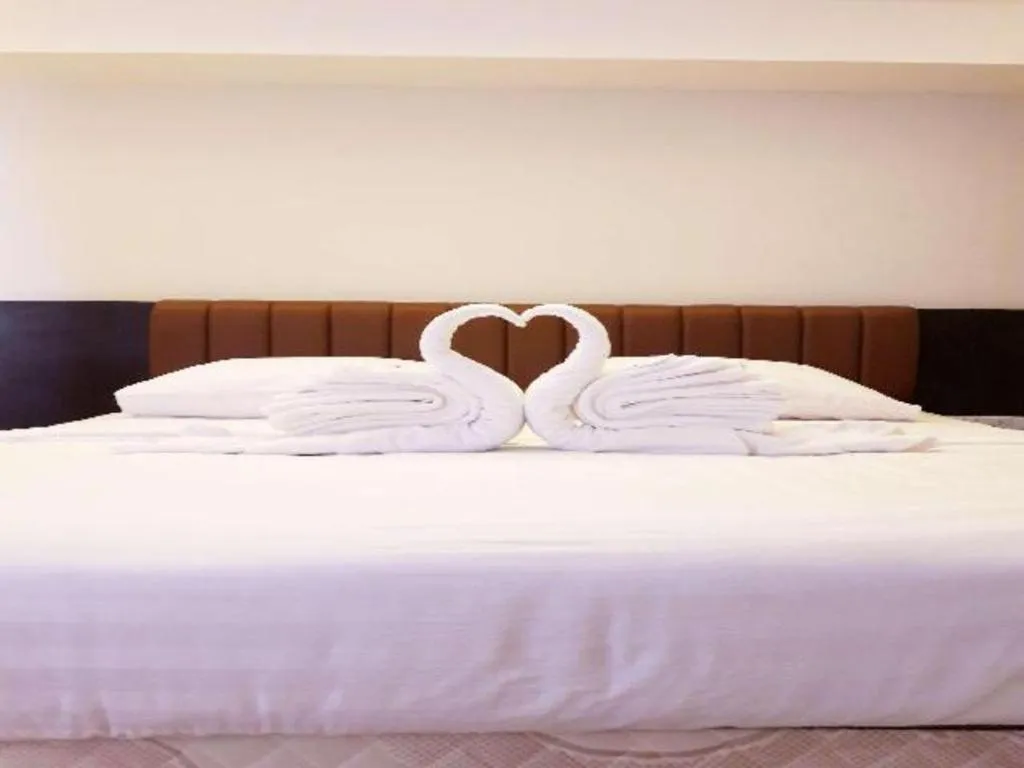 Bed in Karimun City Hotel