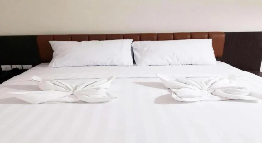 Bed in Karimun City Hotel