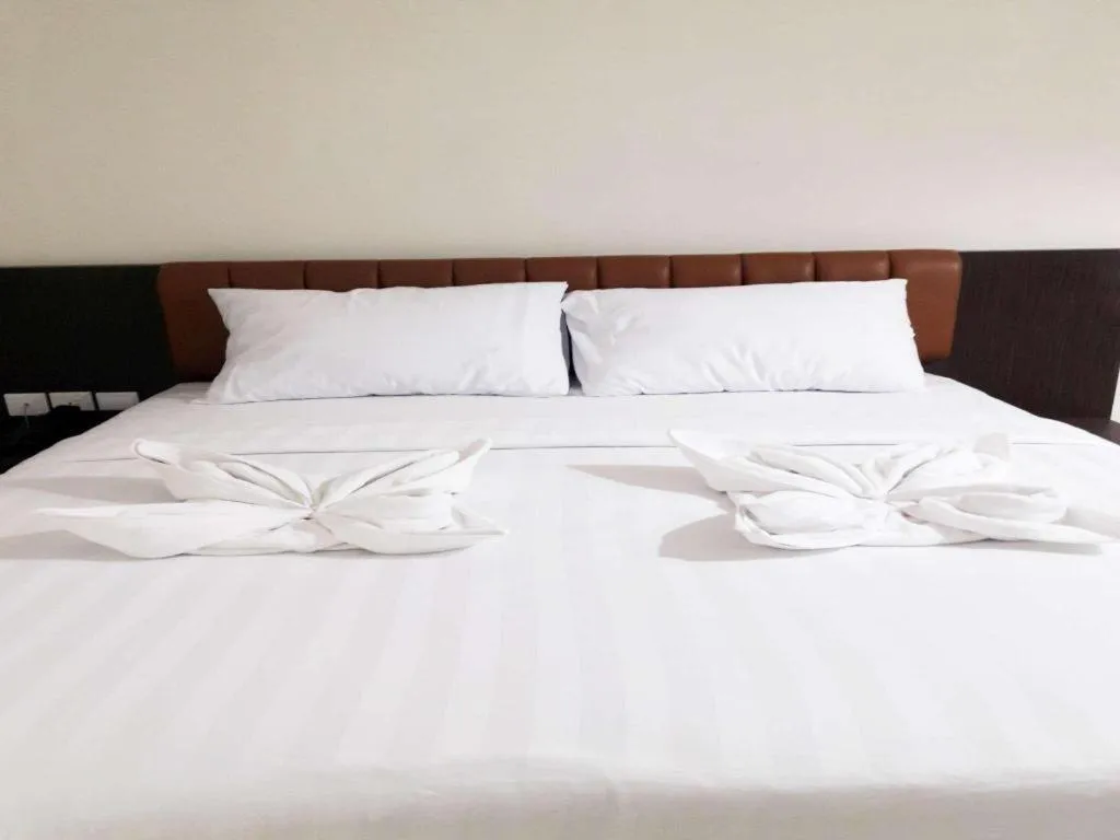 Bed in Karimun City Hotel