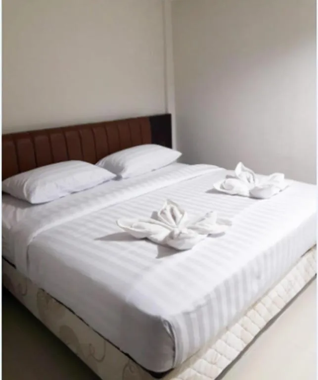 Bed in Karimun City Hotel