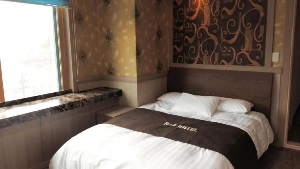 Bed in B&F Hotel