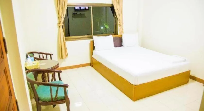 Bed in TAWANCHAY HOTEL PHATTHALUNG