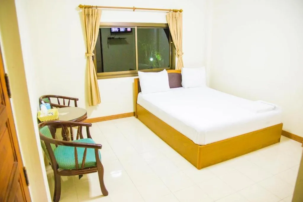 Bed in TAWANCHAY HOTEL PHATTHALUNG