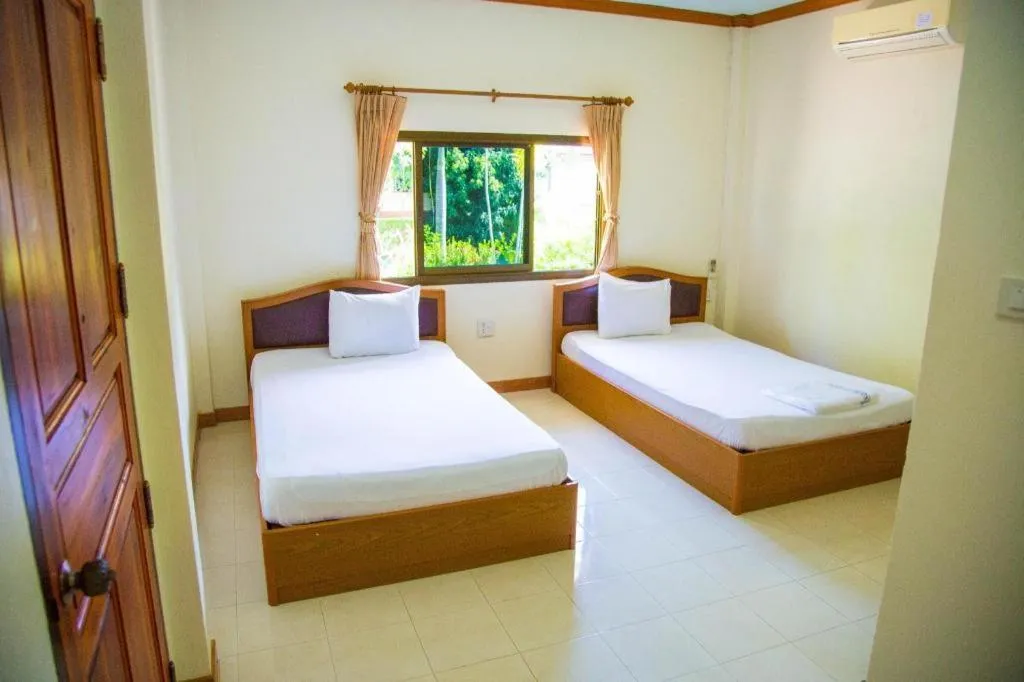 Bed in TAWANCHAY HOTEL PHATTHALUNG