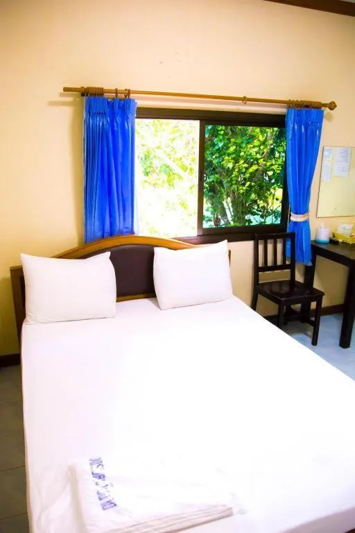 Bed in TAWANCHAY HOTEL PHATTHALUNG