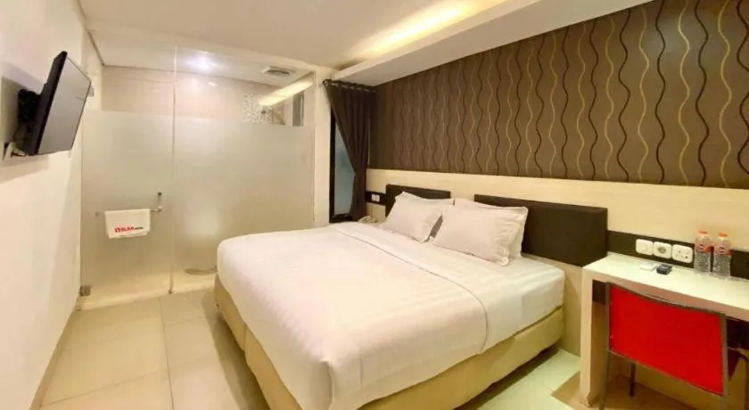 Bed in Sumi Hotel Surabaya