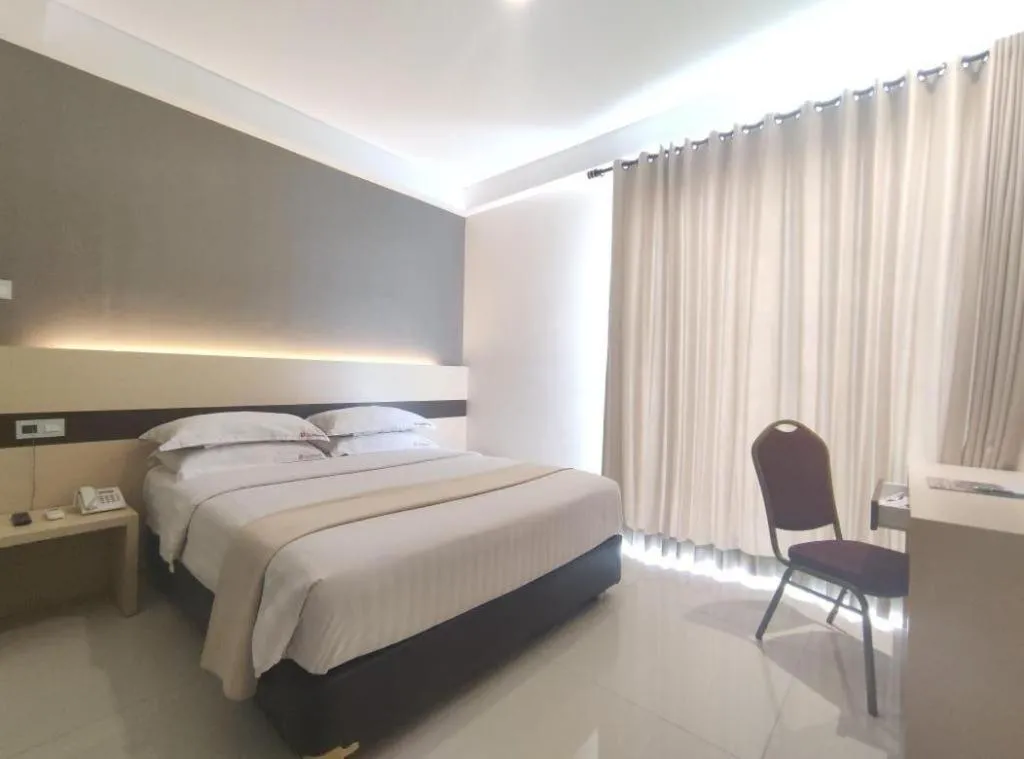 Bed in Sumi Hotel Surabaya