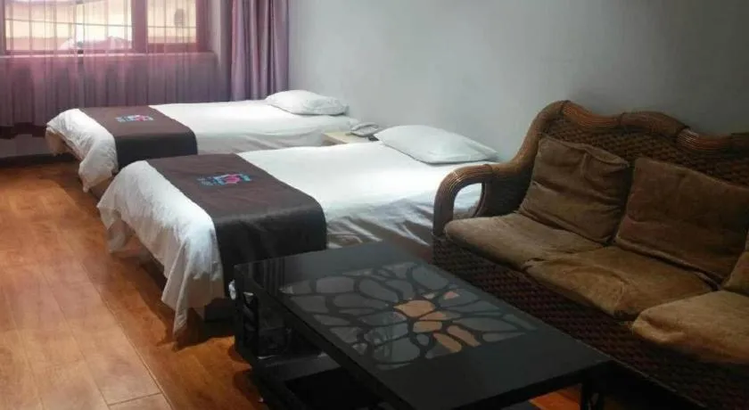 Bed in Pai Hotel Tianjin Binguan Metro Station Municipal Government