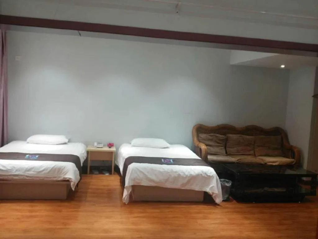 Bed in Pai Hotel Tianjin Binguan Metro Station Municipal Government