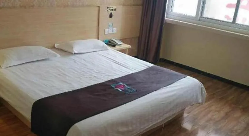 Bed in Pai Hotel Tianjin Binguan Metro Station Municipal Government