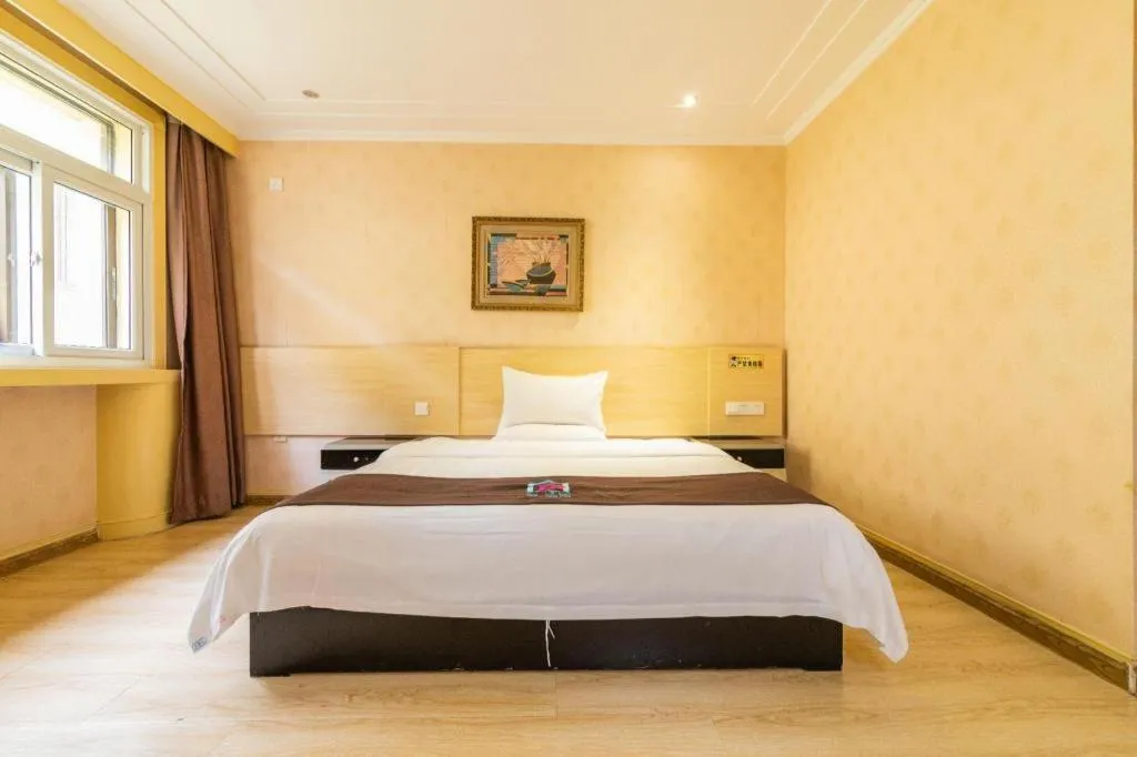 Bed in Pai Hotel Tianjin Binguan Metro Station Municipal Government