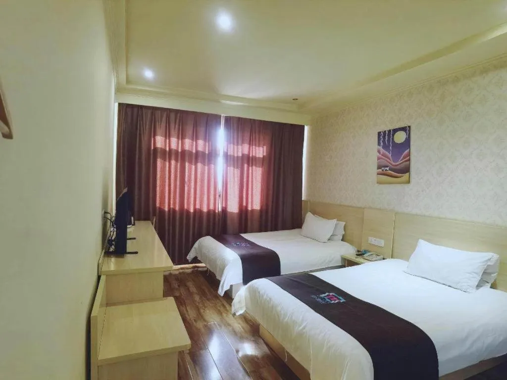 Bed in Pai Hotel Tianjin Binguan Metro Station Municipal Government