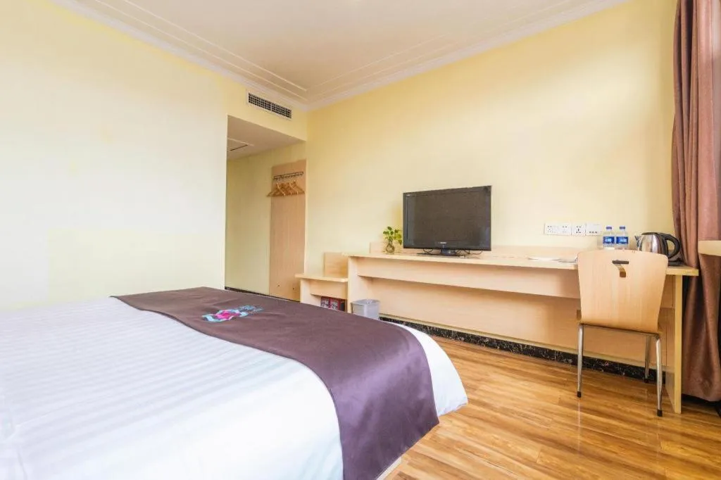 Bed in Pai Hotel Tianjin Binguan Metro Station Municipal Government