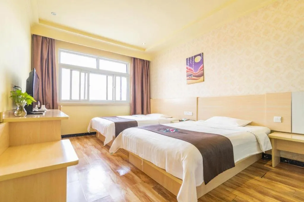 Bed in Pai Hotel Tianjin Binguan Metro Station Municipal Government