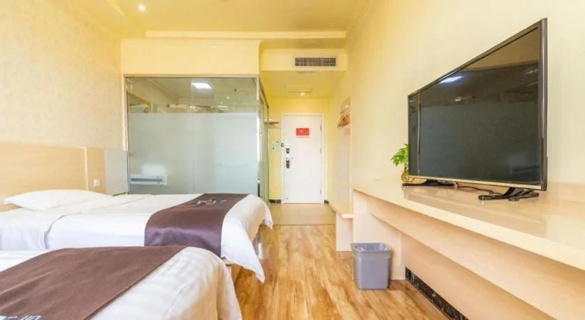 Bed in Pai Hotel Tianjin Binguan Metro Station Municipal Government