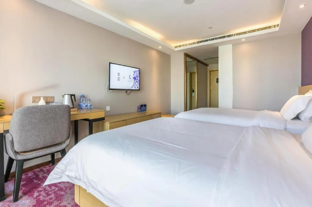 Bed in Lavande Hotel Beijing Olympic Village bird nest