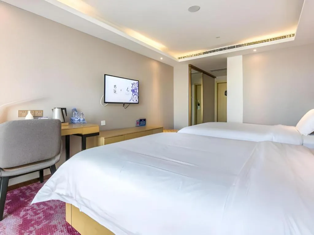 Bed in Lavande Hotel Beijing Olympic Village bird nest