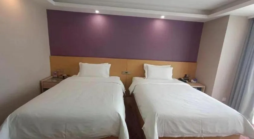 Bed in Lavande Hotel Beijing Olympic Village bird nest