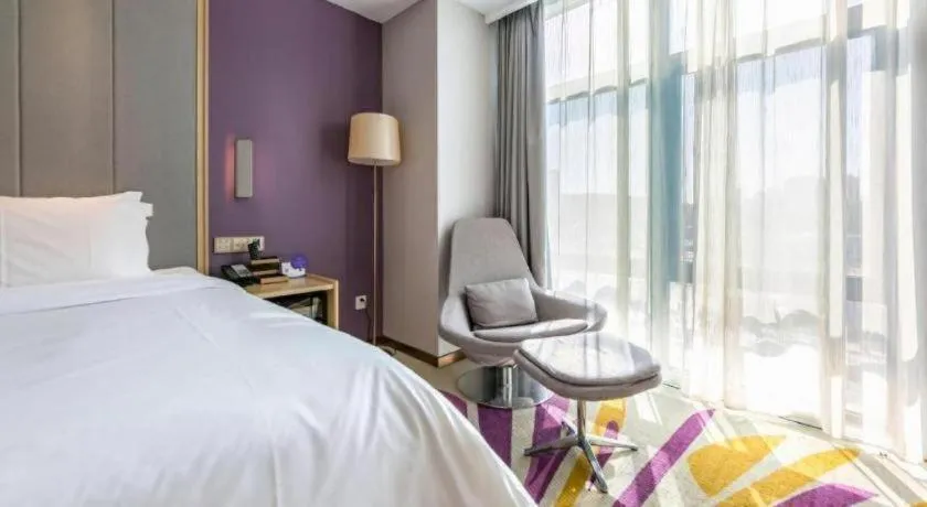 Bed in Lavande Hotel Beijing Olympic Village bird nest