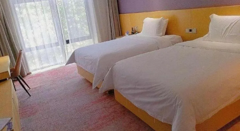 Bed in Lavande Hotel Beijing Olympic Village bird nest