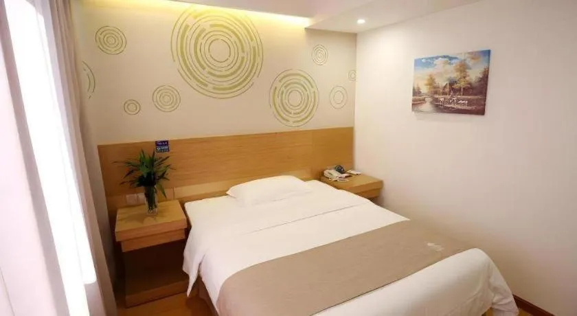 Bed in GreenTree Inn Xuancheng Jingxian Wannan First Street Express Hotel
