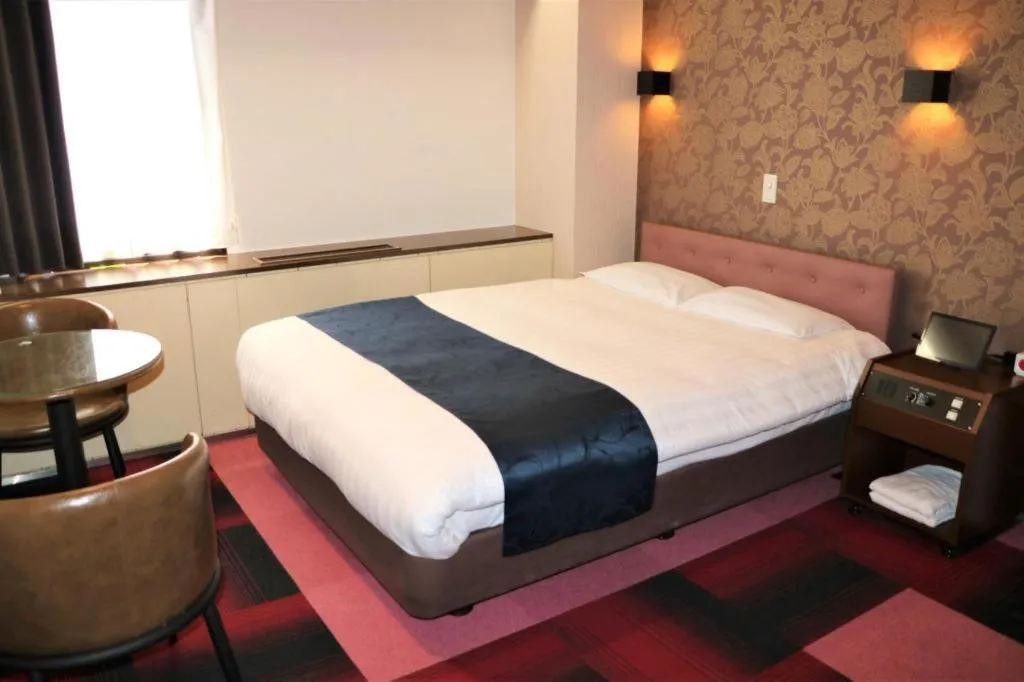 Bed in Hotel Suncity Ikebukuro