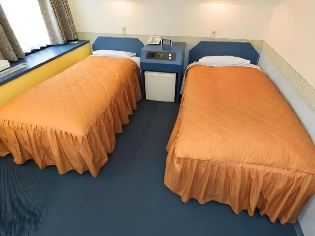 Bed in Hotel Suncity Ikebukuro