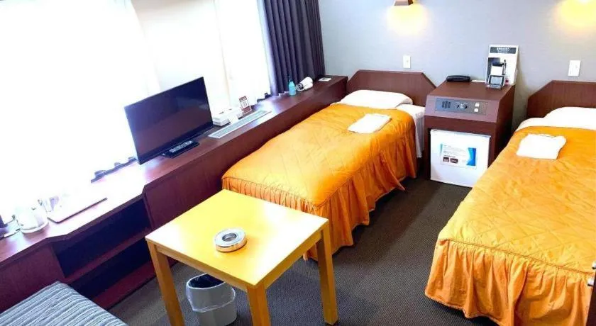 Bed in Hotel Suncity Ikebukuro