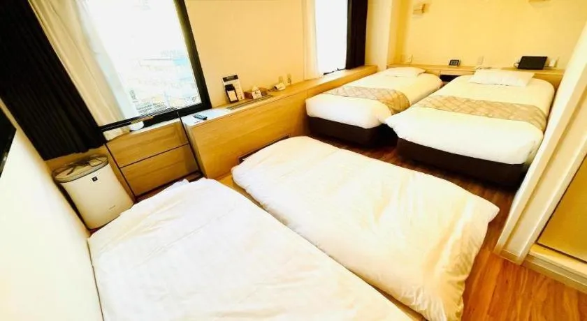 Bed in Hotel Suncity Ikebukuro